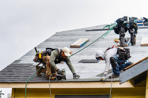 Professional Roof Replacement technician working in Hamilton, MA